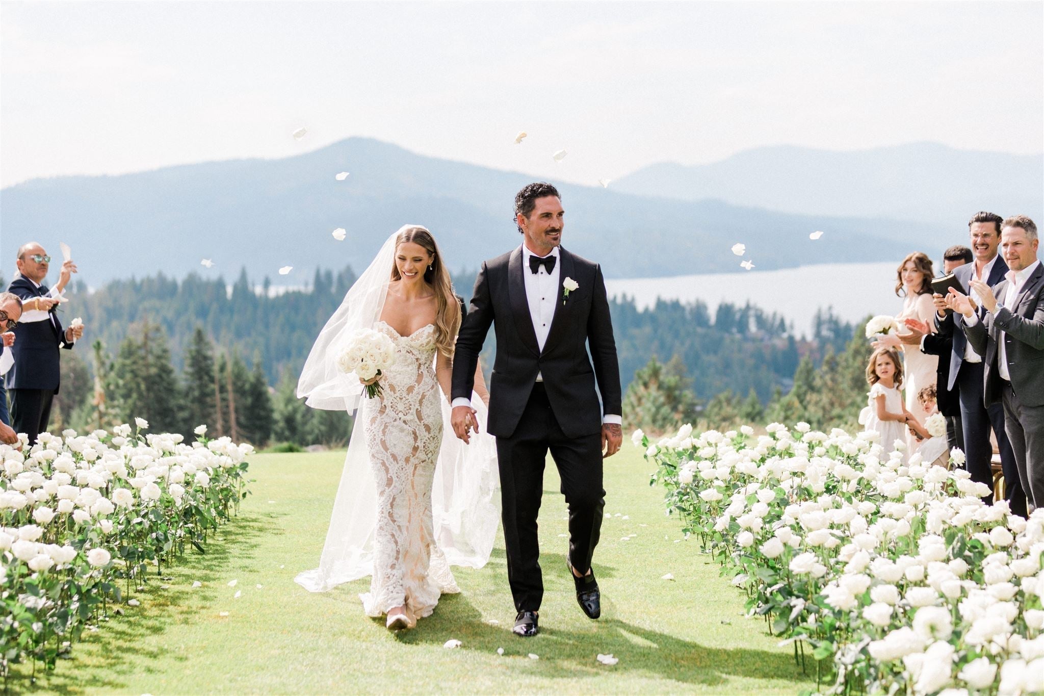Gozzer Ranch Wedding White Roses Aisle